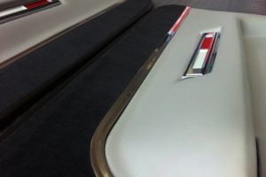 Vintage car dashboard with chrome accents.