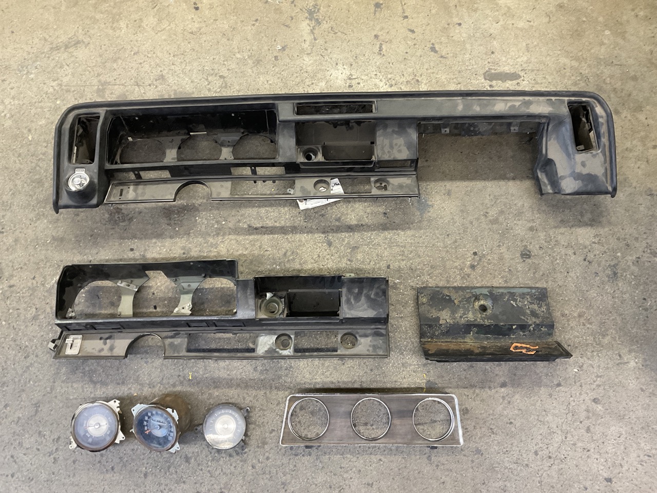 Damaged car dashboard with faded surface